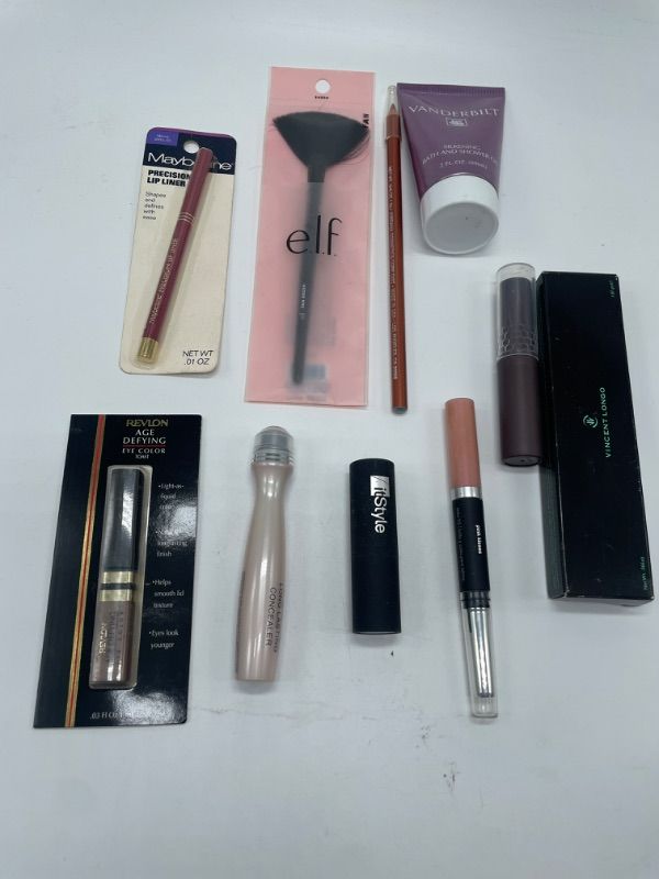 Photo 1 of Miscellaneous variety brand name cosmetics including ((itstyle,vincent longo,revlon,maybeline almay & E.L.F also includes discontinued makeup!))