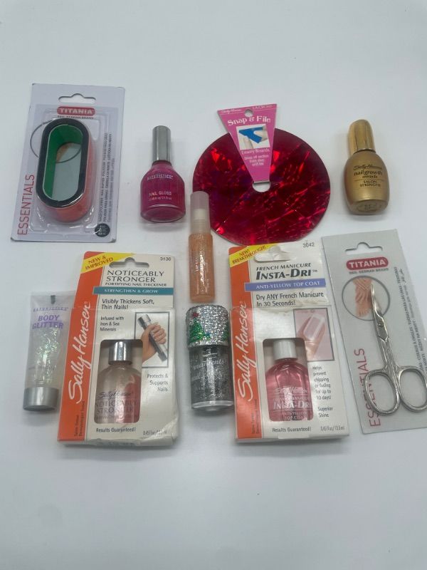 Photo 1 of Miscellaneous Variety Brand nail products nail clippers, nail polish , hard top coat , nail file .