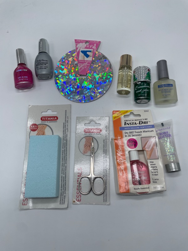 Photo 2 of Miscellaneous variety Nail products ,vitamin E for nails, polish , top coat clippers and emery boards etc.