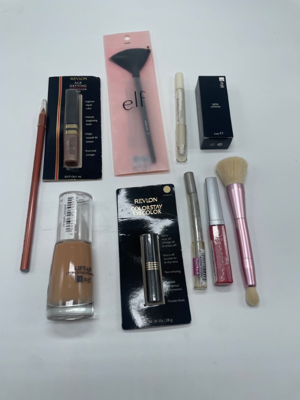 Photo 2 of Miscellaneous variety brand name cosmetics including ((it style ,revlon, & E.L.F)  also includes discontinued makeup