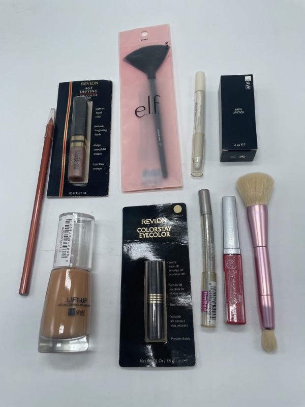 Photo 1 of Miscellaneous variety brand name cosmetics including ((it style ,revlon, & E.L.F)  also includes discontinued makeup