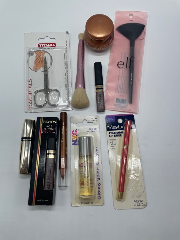 Photo 1 of Miscellaneous variety brand name cosmetics including ((N.Y.C.\,MAYBELINE,Revlon,MILANI ,ITSYLE & E.L.F) also includes discontinued makeup