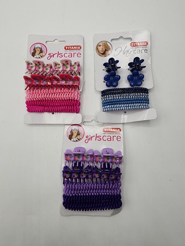 Photo 1 of Titania Section Jaw Clips and Elastics, Rose/Pink, Rose/Purple, Floral/Blue 12 Pieces - Multi Color Claw Clamps & Ponytails