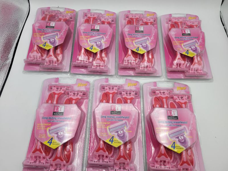 Photo 2 of (7 pack) For Your Daily Touch Triple Blade Disposable Razors 4 count With Pivot Head and Super Comfort Lubrastrip 
