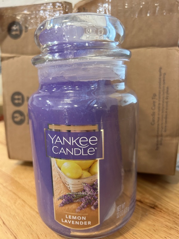 Photo 3 of Yankee Candle Lemon Lavender Scented, Classic 22oz Large Jar Single Wick Candle, Over 110 Hours of Burn Time - CANDLE IS MELTED, SEE PHOTO
