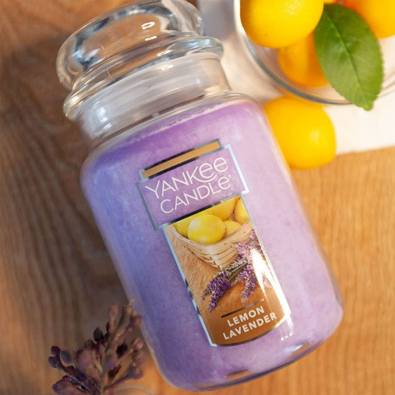 Photo 2 of Yankee Candle Lemon Lavender Scented, Classic 22oz Large Jar Single Wick Candle, Over 110 Hours of Burn Time - CANDLE IS MELTED, SEE PHOTO

