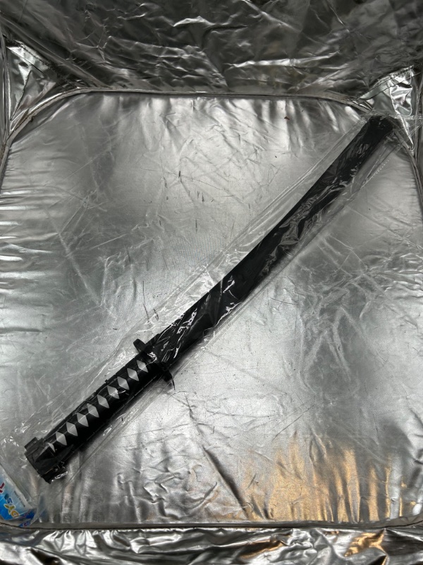 Photo 1 of CHILDRENS TOY SWORD 