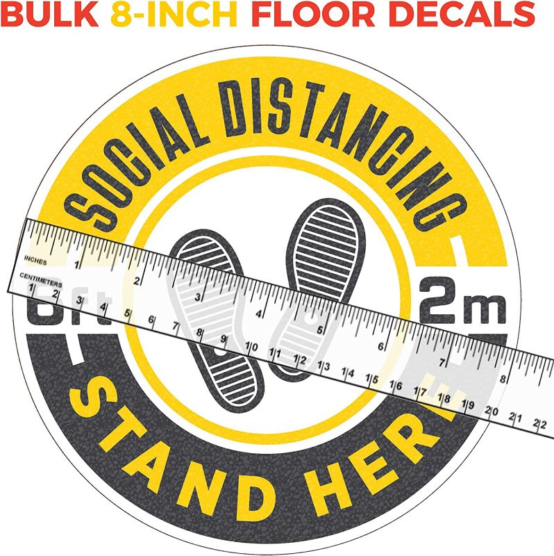 Photo 2 of 12 Pack 8-Inch Social Distancing Floor Sticker Decals - Bulk Professional Anti-Slip, Waterproof 6 Feet Social Distancing Floor Signs - Removable, for Hard Floors Or Carpet
