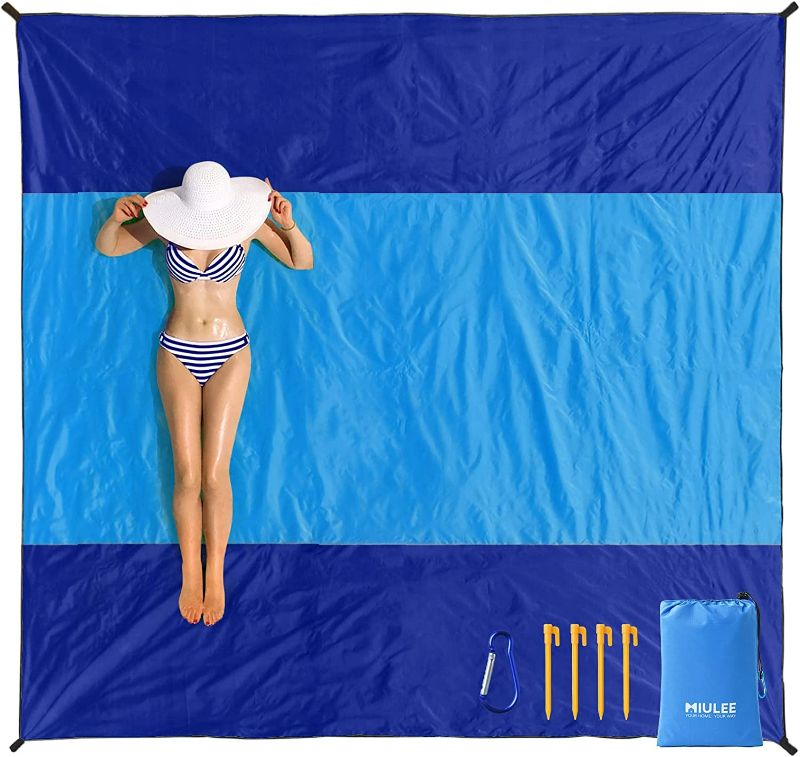 Photo 1 of  Beach Blanket Waterproof Sandproof, Extra Large Beach Mat Oversized , Portable Lightweight Outdoor Blanket with 4 Corner Pockets for Hiking, Picnic, Travel, Camping
