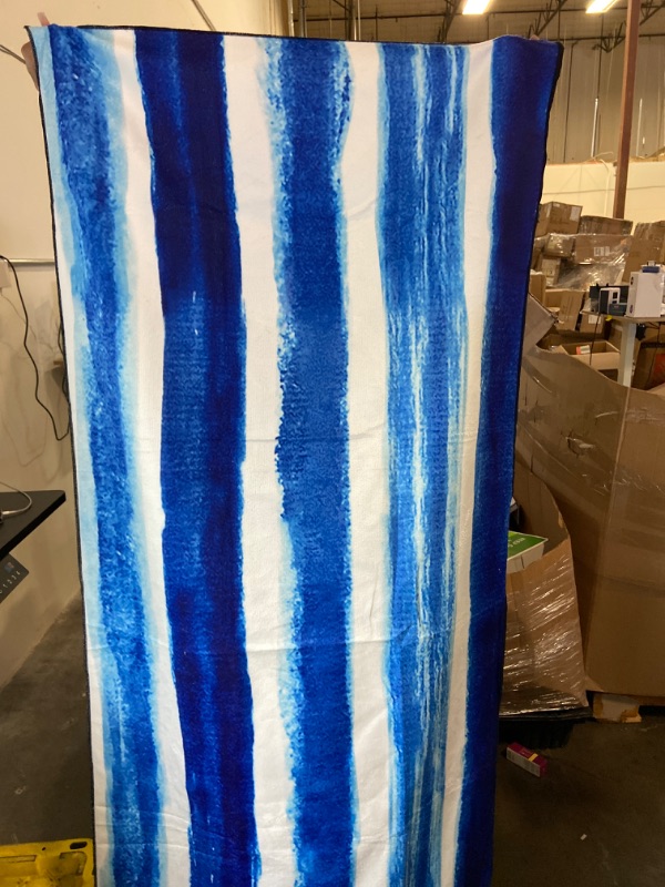 Photo 1 of Blue and white beach towel 