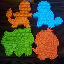 Photo 1 of 4-Pack Pop Bubble Toys, Animal Popper Popping Sensory Anxiety Stress Relief Poppop Gift - Pokemon Characters - Characters May Vary from Stock Photo - see Photos
