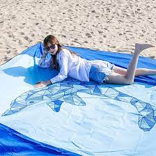 Photo 1 of DEWUR Beach Blanket Sandproof Extra Large Beach Mat, Quick Drying, Soft and Durable Light Weight and Portable, for Travel Camping, Beach Vocation, with 4 Stakes & Pocket (Dolphin, 79”x79”)
