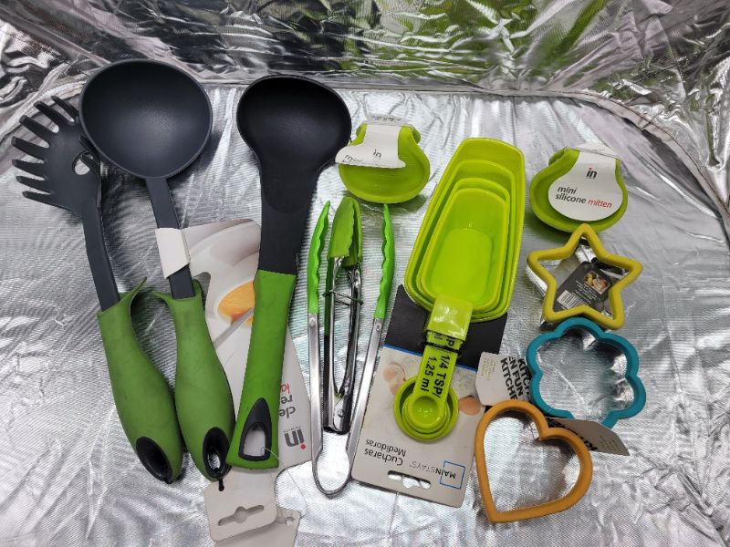 Photo 1 of Assorted Kitchenware Lot - Cooking Utensils, Measuring Cups/Spoons, Cookie Cutters, Mini Silicone Mittens