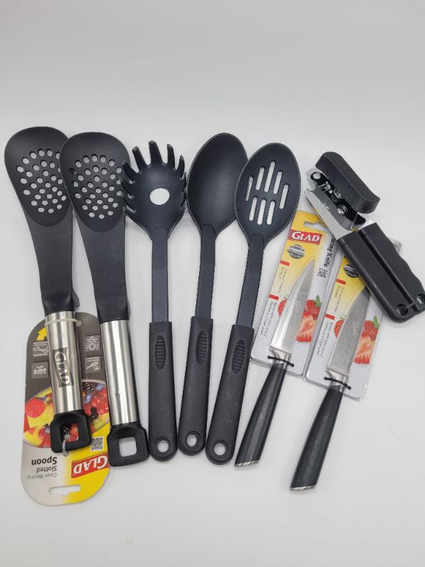 Photo 1 of Assorted Kitchenware Lot - Cooking Utensils, Pairing Knives, Can Opener (Black/Silver)