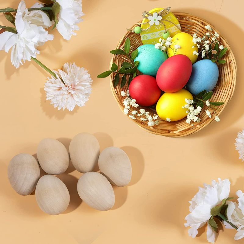 Photo 1 of LAHONI 6 Pieces Unfinished Wooden Eggs, 2.4 Inch Unpainted Wood Easter Eggs Fake Wooden Eggs for DIY Crafts, Easter Ornaments and Gifts, Home Decor (Natural Color)