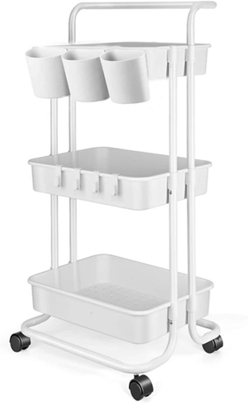 Photo 1 of 3 Tier Utility Rolling Cart - Storage Cart Organizer Cart Kitchen Cart Makeup Cart 3 Shelf Baby Tray Cart with Hanging Cups Trolley Handles and Wheels Use for Bathroom Kids Room Bedroom Office (White)