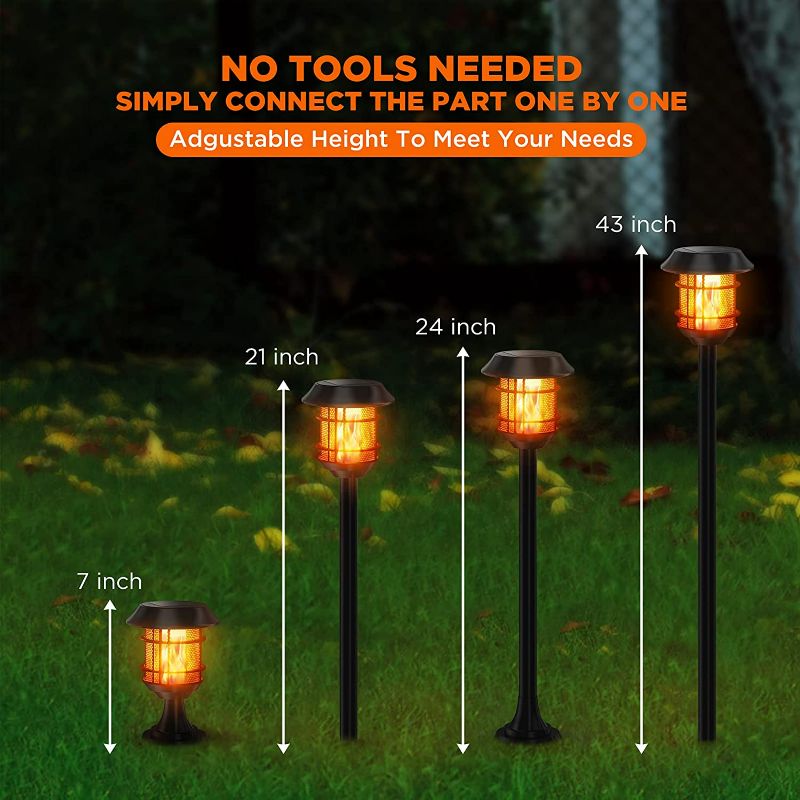 Photo 2 of Balhvit 4 Pack Solar Lights Outdoor Decorative, Up to 12 Hrs Long Solar Garden Pathway Lights, Waterproof Solar Torch Lights with Flickering Flame Landscape Lighting Auto On/Off for Patio, Yard, Pool