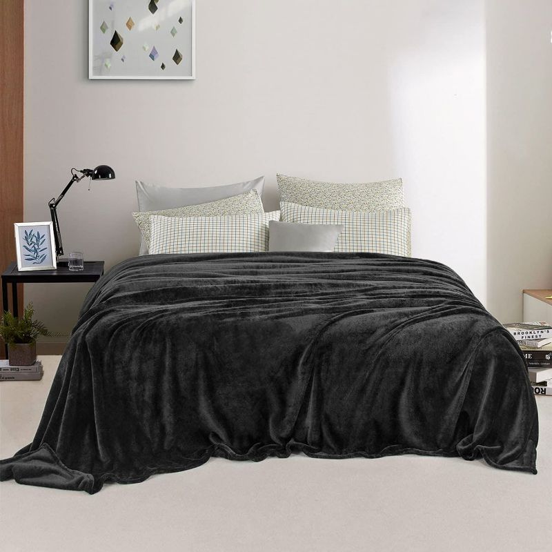Photo 2 of EIUE Comfortable Flannel Throw Blanket,Twin Size Full Body Warming Premium Fleece Bedding Quilt,Reversible Microfiber Blanket for All Season(2 packs Black,60x80inch)