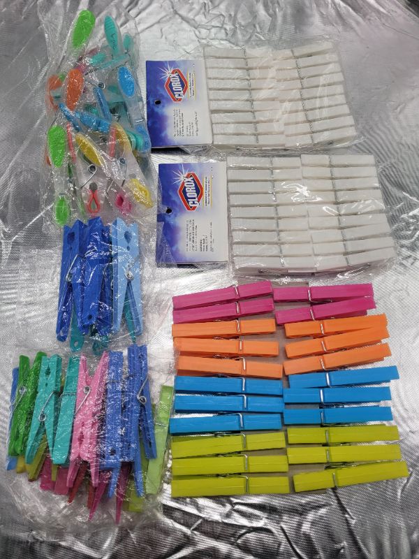 Photo 1 of Assorted Clorox Plastic Clothespins- AS IS