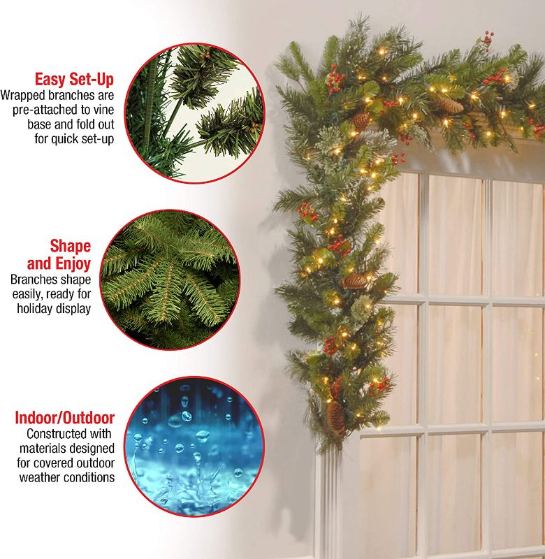 Photo 3 of National Tree Company Pre-Lit Artificial Christmas Garland, Green, Wintry Pine, White Lights, Decorated with Pine Cones, Berry Clusters, Plug In, Christmas Collection, 9 Feet