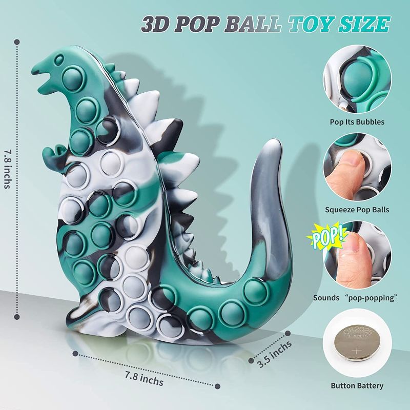 Photo 2 of  Fidget Pop Balls Squeeze Toy Jumbo 3D Godzilla Push Pop Bubble Squeeze Popper Sensory Toy Light up Stress Relief Toys Glow in The Dark Party Gifts for Kids Adults Blue