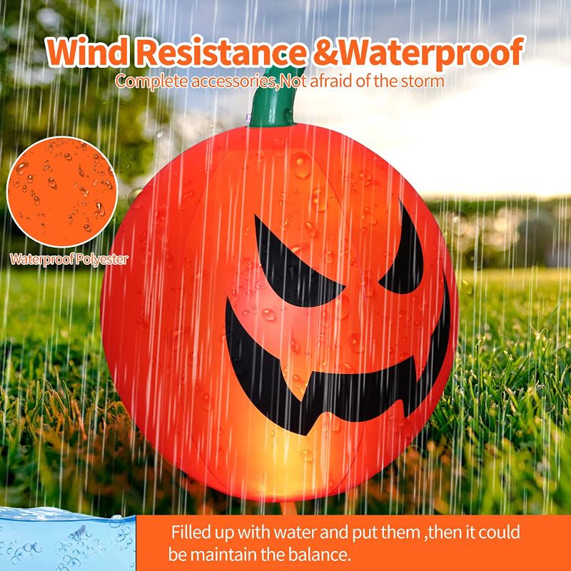 Photo 2 of Halloween Inflatables, 24 Inch Halloween Decorations Blow-Up Pumpkin with Built-in Battery Powered Remote Control Color Changing LED Light, Suitable for Indoor Outdoor Yard Party Halloween Decor