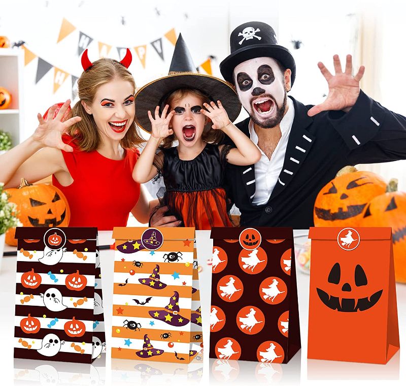 Photo 2 of Halloween Party bags, Goodie Candy Halloween Treat Bags for Kids, Party Favor Bags with 18 Sealing Stickers, Kraft Paper Goody Bags Bulk 12 Pack 2 PACK 