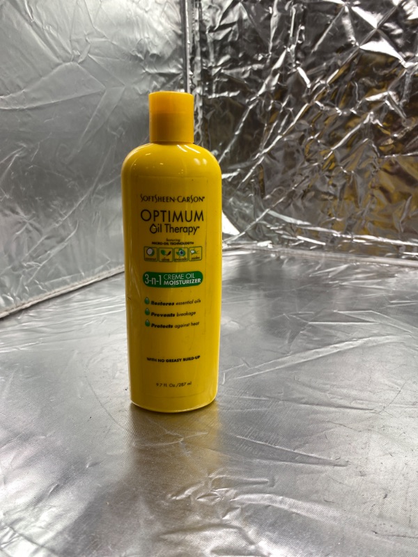 Photo 2 of SoftSheen-Carson Optimum Oil Therapy Micro-Oil Technology 3-In-1 Creme Oil Moisturizer, 9.7 fl oz