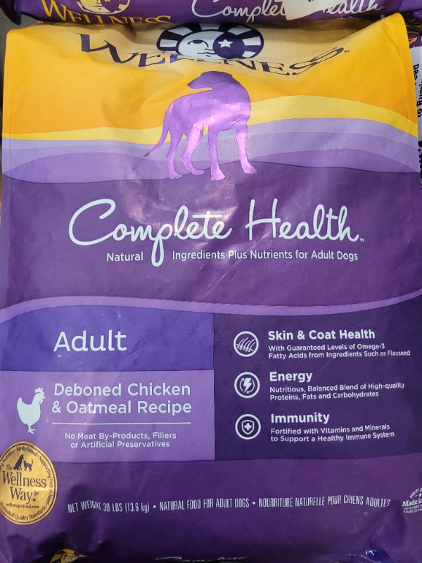Photo 2 of Wellness Complete Health Dry Dog Food with Grains, Made in USA with Real Meat & Natural Ingredients, All Breeds, Adult Dogs (Chicken & Oatmeal, 30-lb) – With Nutrients for Immune, Skin, & Coat Support