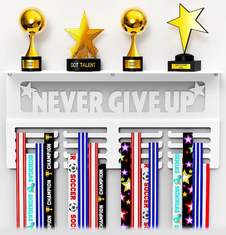 Photo 1 of White Medal Hanger Display with Shelf - Easy Install Metal Award Rack Trophy Shelf for Walls Holds 64+ Sports Medals- Our Never Give Up Wall Medal Holder Includes 10 Inspirational Stickers