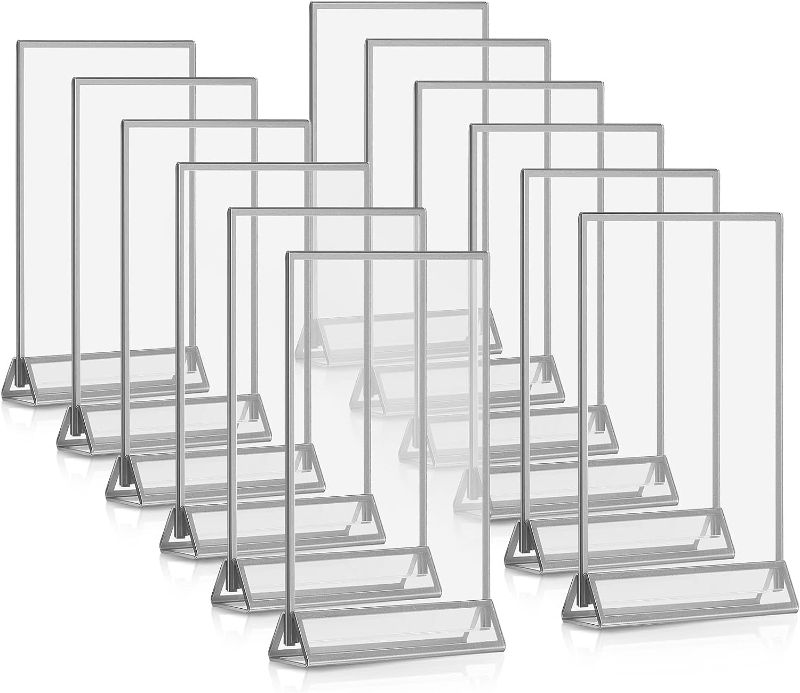 Photo 1 of 12 Pieces Clear Acrylic Table Sign Holders Double Sided Frame Table Menu Holders with Border and Vertical Stand for Table Number Restaurant Sign Photo Menu Holder (Silver,6 x 4 Inch)
