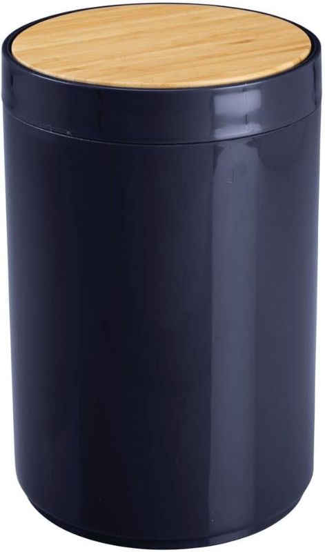 Photo 1 of mDesign Plastic Round Trash Can Small Wastebasket - Garbage Bin Container with Swing-Close Lid - Bathroom Garbage Basket - Holds Waste, Recycling - 1.3 Gallon - Basa Collection - Navy Blue/Natural
