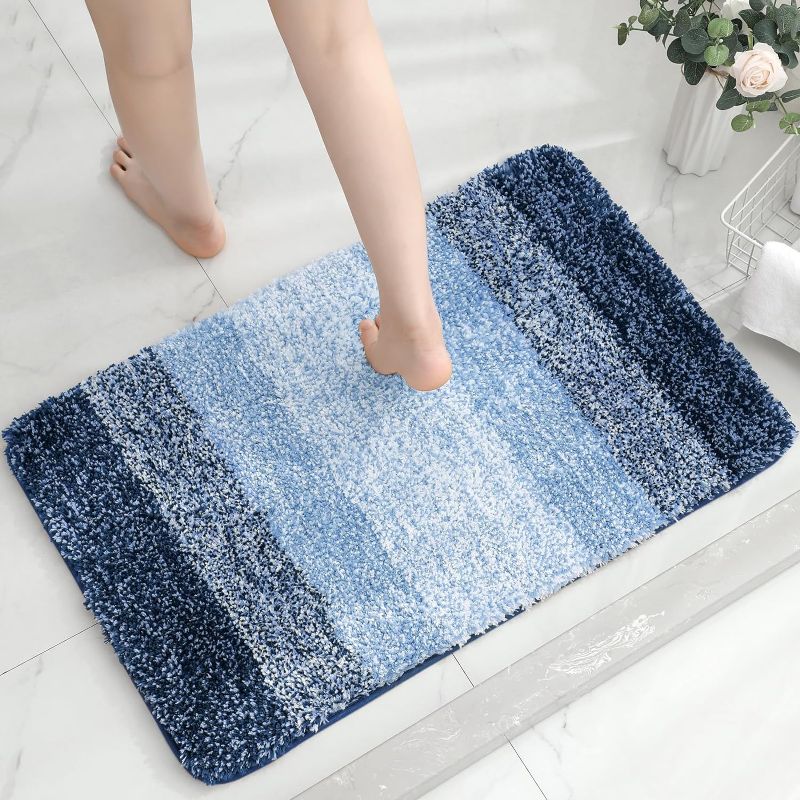 Photo 1 of Gibelle Luxury Bathroom Rug, Extra Soft and Absorbent Microfiber Shaggy Bath Mat, Non-Slip Thick Plush Bathroom Mat, Machine Washable Bath Rug for Bathroom Floor, Tub and Shower (16"x24", Navy Blue)
