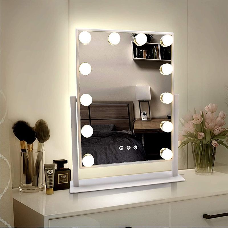 Photo 1 of WEILY Hollywood Makeup Mirror with Lights,Large Lighted Vanity Mirror with 3 Color Light & 12 Dimmable Led Bulbs,Smart Lighted Touch Control Screen & 360 Degree Rotation(White)
