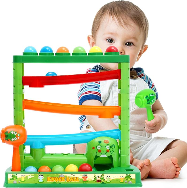 Photo 1 of KIZZYEA Toddler Montessori Toys for 12 Months+, Pound a Ball Toy Set with 12 Balls and 2 Hammers, Early Developmental Educational Toys for 18 Months for for 1 2 3 Years Old Boy Girl
