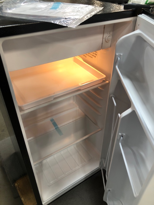 Photo 3 of **** NEW **** *** TESTED POWERED ON ***
RCA RFR322 Mini Refrigerator, Compact Freezer Compartment, Adjustable Thermostat Control, Reversible Door, Ideal Fridge for Dorm, Office, Apartment, Platinum Stainless, 3.2 Cubic Feet
