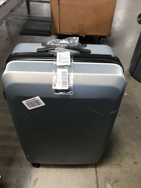 Photo 3 of **scratched & cracked**
American Tourister Moonlight Hardside Expandable Luggage with Spinner Wheels, Silver, Checked-Large 28-Inch