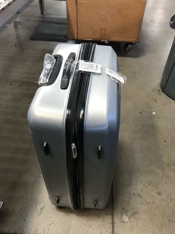 Photo 2 of **scratched & cracked**
American Tourister Moonlight Hardside Expandable Luggage with Spinner Wheels, Silver, Checked-Large 28-Inch