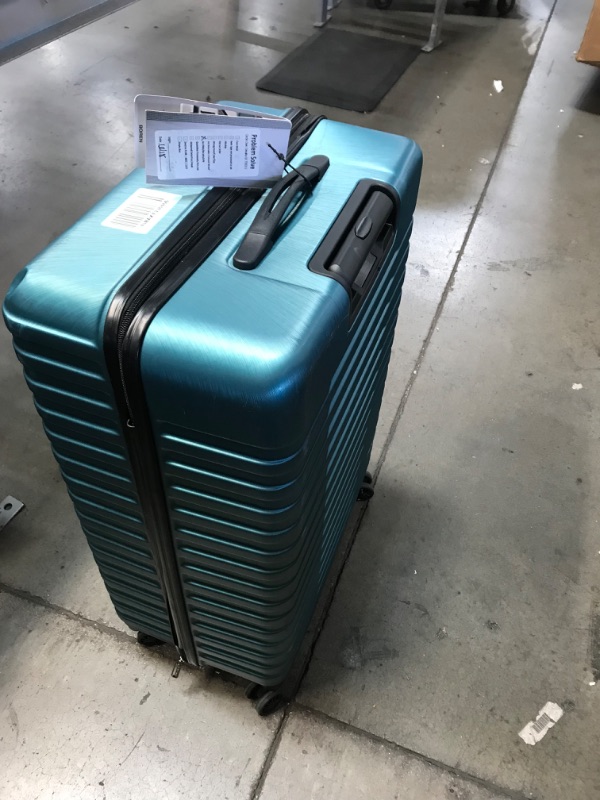 Photo 3 of **used- scratched**
U.S. Traveler Boren Polycarbonate Hardside Rugged Travel Suitcase 