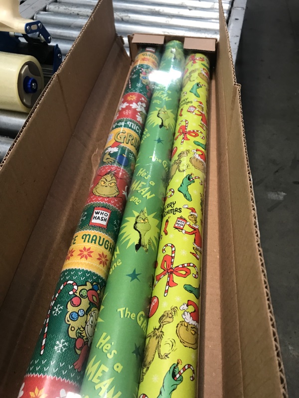 Photo 2 of American Greetings Christmas Wrapping Paper with Cut Lines Bundle, The Grinch (3 Rolls, 105 sq. ft.)