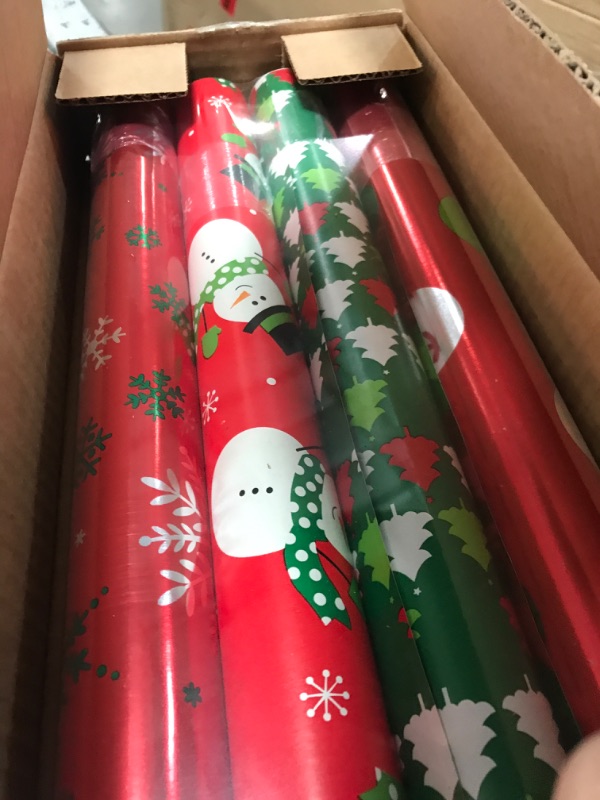 Photo 2 of American Greetings Christmas Reversible Wrapping Paper Bundle, Polka Dots, Trees, Snowmen and Snowflakes (4 Rolls, 120 sq. ft.) Polka Dots, Trees, Snowmen and Snowflakes Wrapping Paper