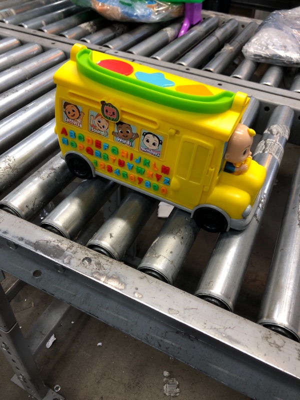 Photo 1 of CoComelon Musical Learning Bus, Number and Letter Recognition, Phonetics, Yellow School Bus Toy Plays ABCs and Wheels on the Bus, by Just Play
