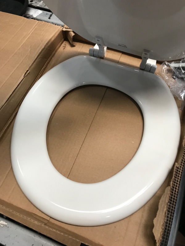 Photo 3 of **box has been opened**
BEMIS 400TTA 000 Economy Toilet Seat, Durable Enameled Wood, ROUND, White 1 Pack Round