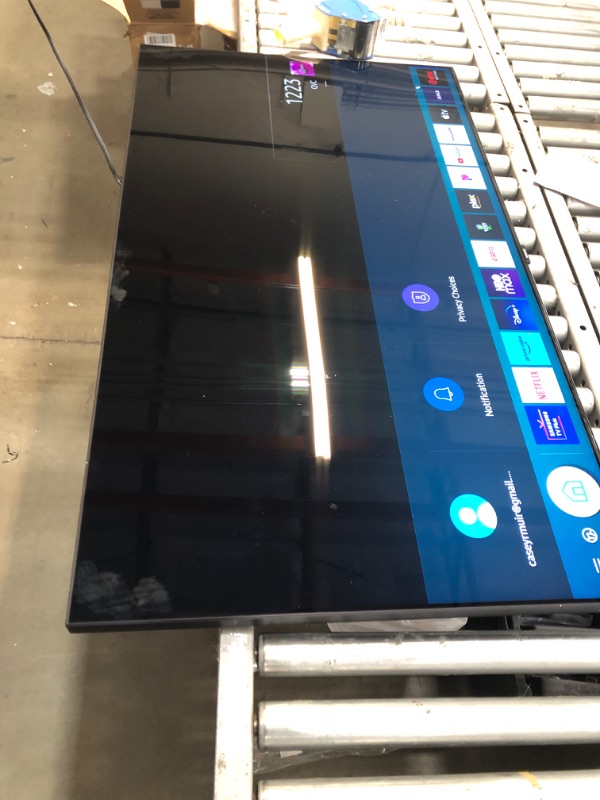 Photo 2 of *HAS A SCRATCH DOES NOT EFFECT DIGITAL DISPLAY* SAMSUNG 55-Inch Class QLED 4K UHD Q90T Series Quantum HDR Smart TV w/Ultra Viewing Angle, Adaptive Picture, Gaming Enhancer, Alexa Built-in (QN55Q90TDFXZA)
