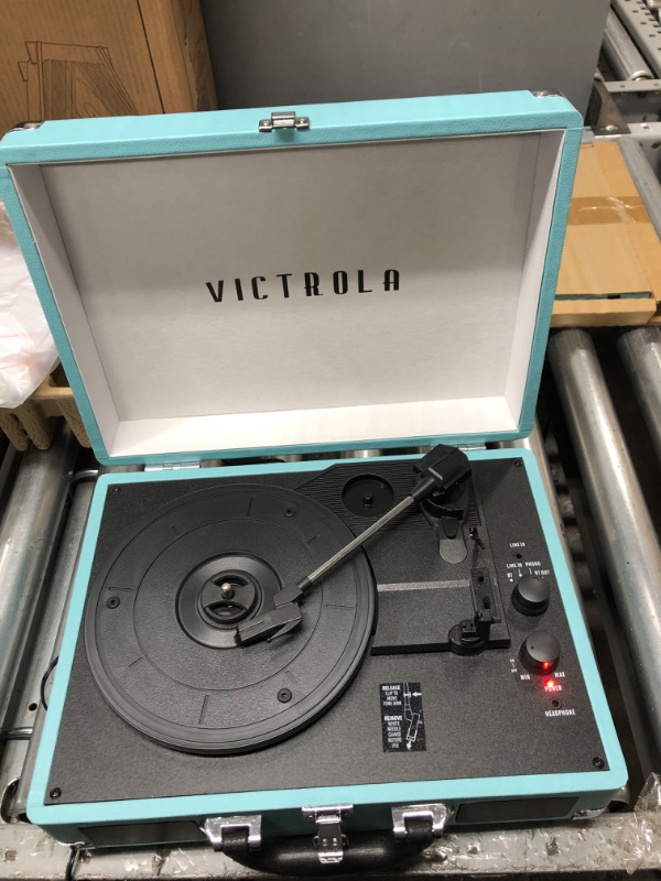 Photo 2 of TURNS ON*
Victrola Vintage 3-Speed Bluetooth Portable Suitcase Record Player with Built-in Speakers | Upgraded Turntable Audio Sound| Includes Extra Stylus | Turquoise, Model Number: VSC-550BT