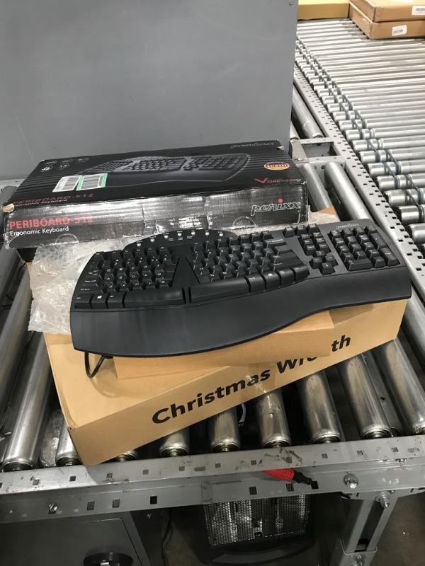 Photo 1 of Perixx Periboard-512 Ergonomic Split Keyboard - Natural Ergonomic Design - Black - Bulky Size 19.09"x9.29"x1.73", US English Layout