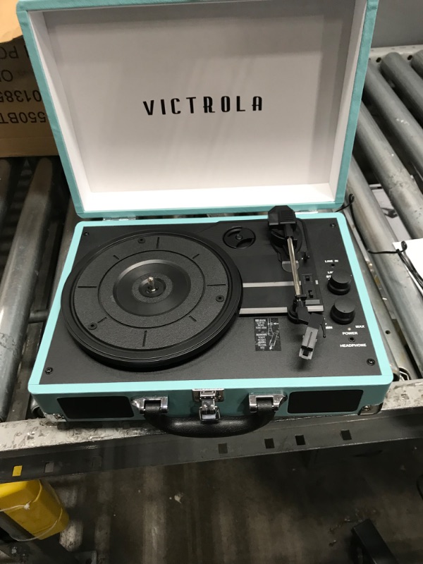 Photo 2 of Victrola Vintage 3-Speed Bluetooth Portable Suitcase Record Player with Built-in Speakers | Upgraded Turntable Audio Sound| Includes Extra Stylus | Turquoise, Model Number: VSC-550BT
NEEDS REPAIR