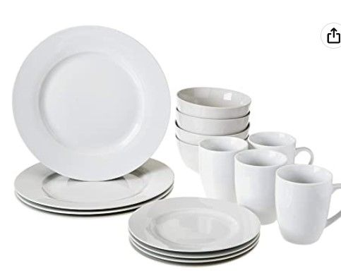 Photo 1 of Amazon Basics 16-Piece Porcelain Kitchen Dinnerware Set with Plates, Bowls and Mugs, Service for 4 - White
