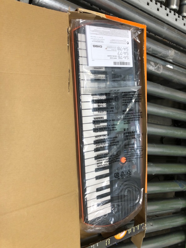 Photo 2 of Casio SA-76 44-Key Mini Personal Keyboard ORANGE SA-76 Keyboard