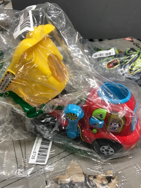Photo 4 of ***BUNDLE*** VTech Drop and Go Dump Truck Toy and Pack of Sesame Street Disposable Bibs